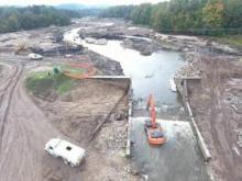 equipment removes sections of Sabin Dam