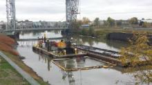 Mechanical dredging of contaminated sediment in the Buffalo River. (Credit: Brian Murphy)