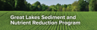 Photo of a green crop field with the overlaid text Great Lakes Sediment and Nutrient Reduction Program