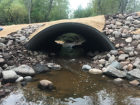 After photo of culvert replacement project. Water flows freely through the newly opened wider culvert